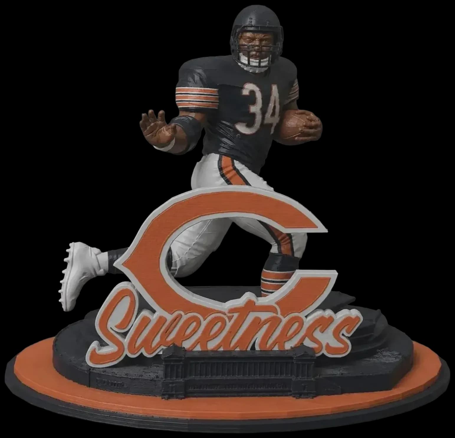 3D printed football player display in a dynamic running pose, mounted on a team-branded base